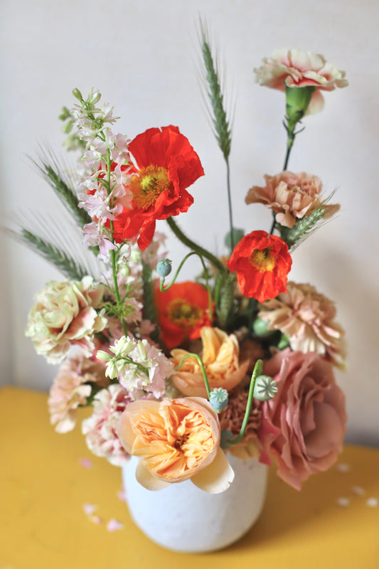 indianapolis and carmel area floral design by solstice including peach, blush and orange flowers